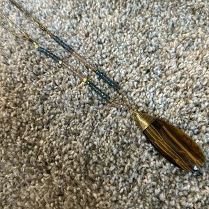 Beaded statement necklace blue and clear beads w tortoise shell pattern charm